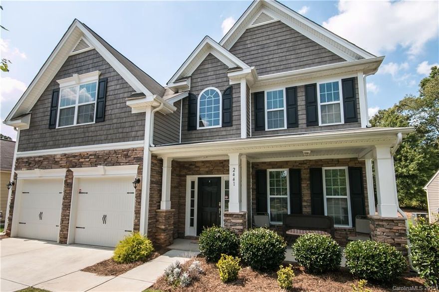 Gorgeous upgraded home featuring 5 bedrooms or 4 bedrooms plus a bonus room, 3 full baths, downstairs bedroom/ office suite with separate entrance which can be used as an office or business, granite counter tops, new laminate flooring down, crown molding down, expanded patio and tons of space.