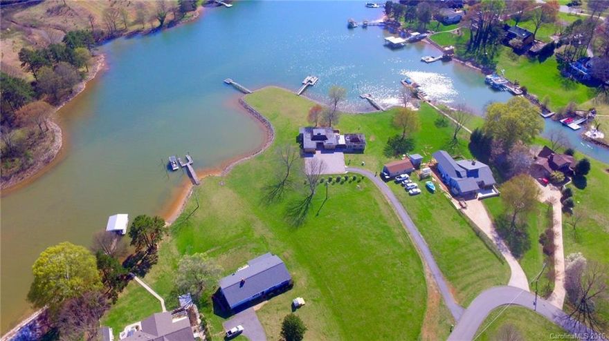 Auction, Pre auction offers accepted. .77+/- Acre Lake Norman Lot With Dock on Perrin Dr., Mooresville, NC
• Tax Value of $250,000.00
• Floating Dock
• Perk Permit for a 4 Bedroom Home
• Septic: Soil scientist has done a design. Iredell County has the design. 
• Septic Easement From Adjoining Property
• Zoned “RA”
• Iredell Lots Can Be Combined
• 8% Buyer’s Premium
• Subject to Restrictions
Reserve $139,000.00