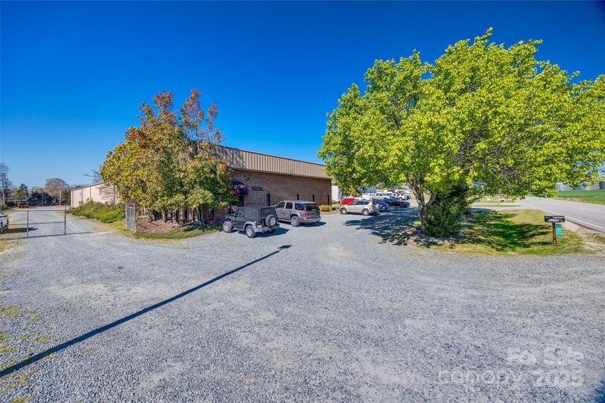 AVAILABLE FOR SALE OR LEASE! This property offers an excellent opportunity for a wide range of industrial uses through Stallings IND zoning. Two buildings totaling 24,860 SF. The larger building is 16,860 SF, including approximately 3,000 SF of main level office space, mezzanine office, and the remaining is warehouse area currently utilized for manufacturing. The second building offers 8,000 square feet of warehouse space, ideal for storage or additional production. Combined 2 dock doors and 2 drive-in doors.