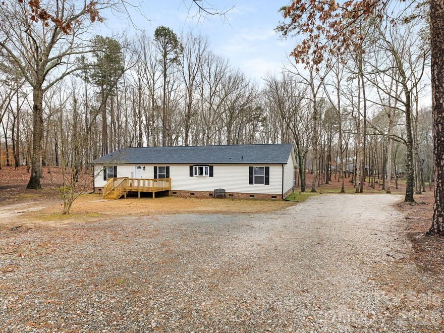 Newly remodeled ranch home in a beautiful park like setting in Chesterfield county. Minutes to Pageland and Monroe, Charlotte is about a 40 minute drive. The property features a well maintained mature tree forest that was cleared within the last two years with large parking area. The kitchen and bathrooms have been remodeled within last 2 years, newer roof. House also features updated light fixtures, fresh paint, laminate wood flooring. Appliances updated in the last two years. This property is very serene and peaceful, a must see. Area is rapidly growing with many new subdivisions built near Pageland.