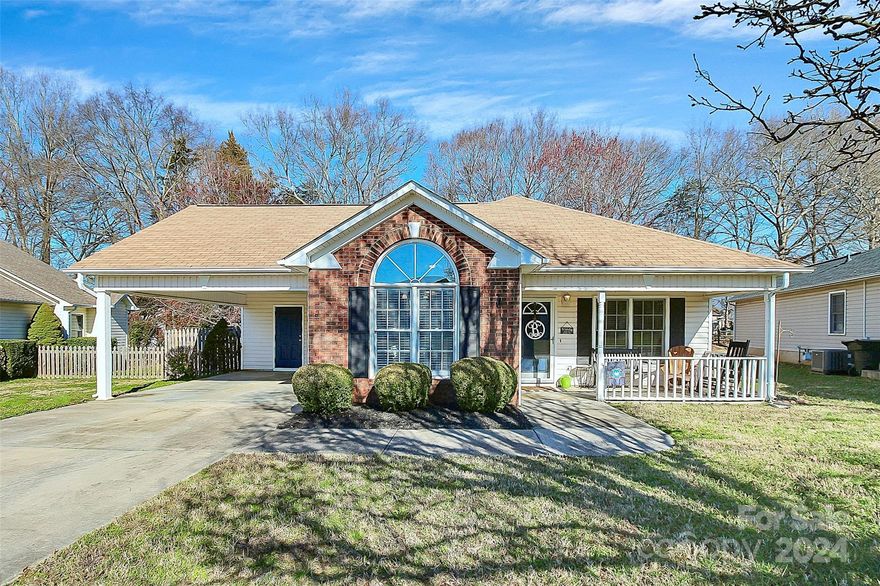 Welcome Home! This beautiful property in the heart of Rock Hill is one you will fall in love with. As you enter, you are greeted with vaulted ceilings, a cozy fireplace, and a comfy living space. As you venture through, you will find plenty of space to entertain in the living room and dining area. The kitchen has all you need as well. Continuing down the hall, you will find spacious bedrooms, and bathrooms. The primary has beautiful vaulted ceilings and equip with an oversized bathroom, with a garden tub and shower. Once you go outside, you'll love the porch and fenced in back yard. The storage building will definitely come in handy. Come check out all this home has to offer. Book your showing today.