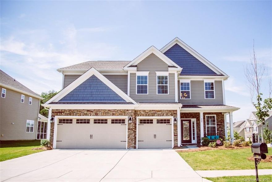 Welcome Home! Less than 2 yrs old! Absolutely Gorgeous! 5BR-4 Full Bath Beauty in Lake Ridge in Tega Cay! Stunning Gourmet Kitchen w/ beautiful cabinets, huge island, double oven & upgraded stainless appliances. Fridge Stays! Guest Suite down, Huge Master Suite up! Large shower, oversized soaker tub & cozy sitting room in Master! 3 add'l BRs up w/ 2 add'l full baths! Fun loft up! Custom patio w/ stone fireplace & wooded views! Corner Lot! Washer & Dryer Stays! 3 car garage! Fort Mill Schools!