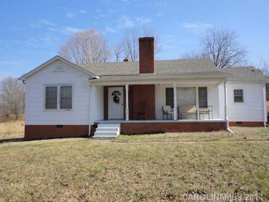 Come take a look at this adorable home on 4+ acres. Beautiful original hardwood floors cover most of the home with fresh paint. Roof is less than 2 years old. 2 outbuildings on the property. Great starter home!!