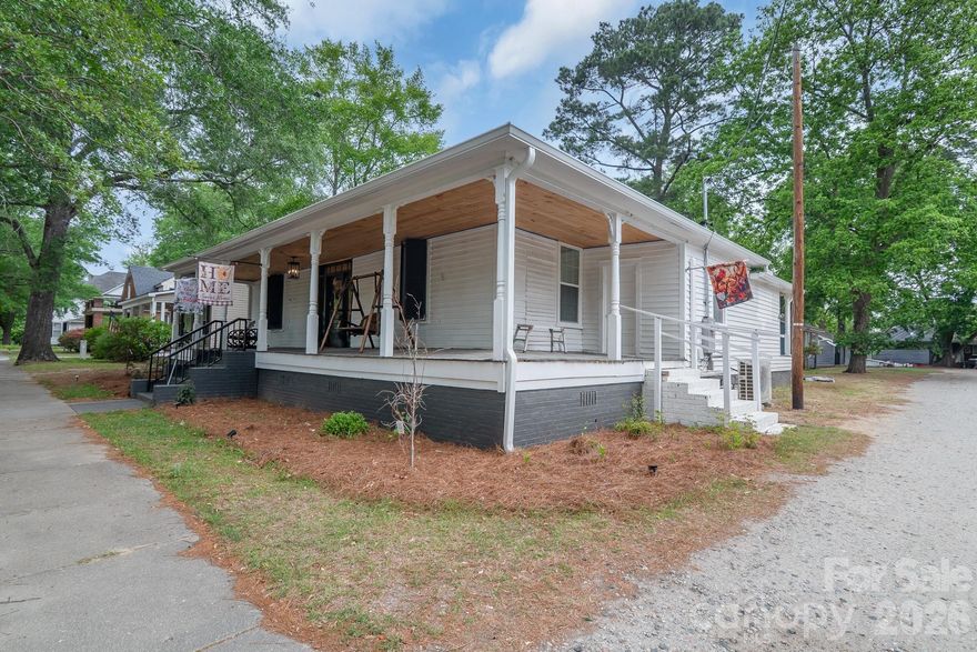 Welcome to charming Cheraw, SC! This beautifully renovated and furnished 4-bedroom, 2.5-bath home blends historic character with modern comfort in a desirable historic district setting.
Originally built over 100 years ago, this home has been completely updated from top to bottom. Enjoy peace of mind with brand-new windows, new HVAC system (including split unit), and all-new flooring throughout. The thoughtfully redesigned kitchen features a refrigerator, electric range, cooktop, exhaust hood, dishwasher, and microwave, and now opens seamlessly into the dining area—creating a bright, open-concept layout perfect for everyday living and entertaining.
A former closet has been converted into a convenient half bath, adding both function and value. Step outside to a fully remodeled rear deck, enhanced for added privacy—ideal for relaxing or hosting guests. Additional storage space ensures everything has its place.
Located directly across from a newly built pickleball court, this home offers both lifestyle appeal and strong investment potential. Whether you're looking for a primary residence or an income-producing opportunity, this property delivers the perfect mix of charm, updates, and location.