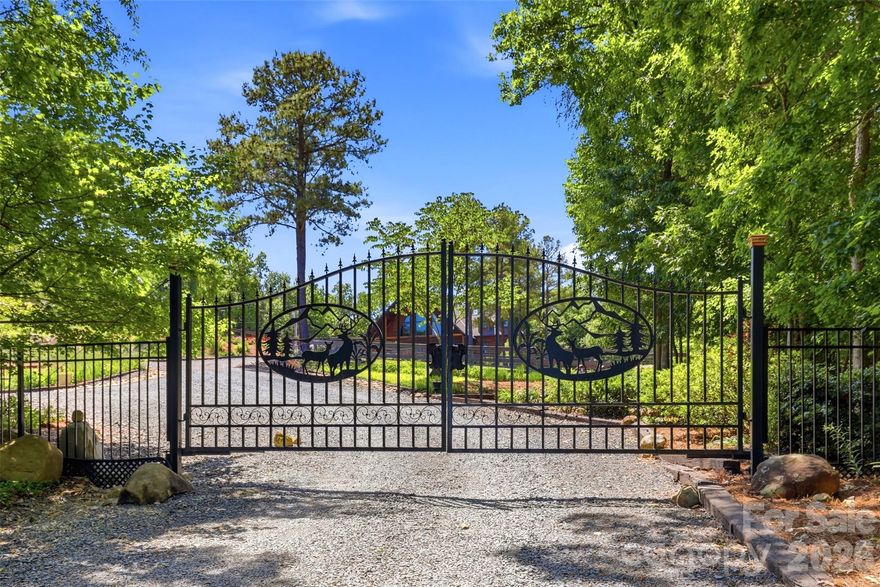 Drone and aerial pictures showing the land and views to be added shortly. Cross listed as MLS#4376520. Hawk's Nest is the combination of two parcels, making it just over a 14 acre estate overlooking Lake Tillery. 416 includes a 1,300 sq foot rustic cabin, a waterside dock with boat lift and entertaining deck with kitchen. With 104' of waterfront, you can enjoy plenty of space on the water. Off the water, tucked away in the wooded lot, there are also 2 barns, riding ring, orchards and a 7,000 sq foot lodge. 
The property is on city water, however, there are 2 wells, used mainly for irrigation. The cabin well has just been completely serviced and replaced (May 26).

Development options are available as this is zoned R-20 which allows for 2-3 homes per acre. The town of Norwood's Land Use Plan includes this in the tourism encouragement zone for even more potential development.

**For more pictures of the lodge, please see Residential listing MLS#4376520.