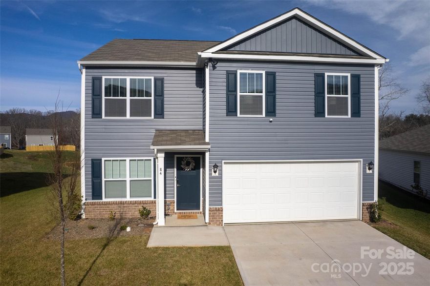 Now available, this great custom 2 story home in a brand new community, Patton Cove with walking trails and playground in Historic Clyde, NC. Spacious floor plan with 4/2/1, all bedrooms are upstairs with great space on the main level for entertaining with formal dining room and kitchen/living room combo with island. Upgrades solid surface (granite) countertops with cultured marble in the bathrooms. Main level floors are Luxury Vinyl Plank for easy maintenance. Complete with stainless steel upgraded appliances along with large pantry. Great location between Asheville and Waynesville, close to shopping, dining and much more. Don't miss this opportunity to live in a recently built like new home, perfect for family living with flat front and back yard. Wood fence for screening. Sit out back on the patio next to the firepit and enjoy the mountain views overlooking a pond. Restrictions apply.