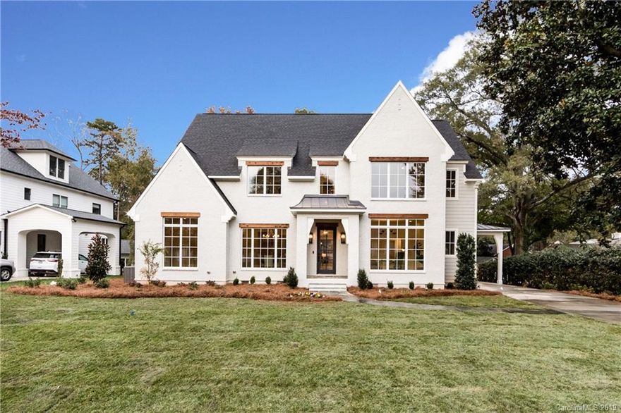 The one you’ve been waiting for. Just completed, this brilliantly designed Cotswold abode was built with integrity for someone to call home. Featuring white oak floors, Visual Comfort lighting, high ceilings, tall windows, beautiful site lines, perfect flow & custom high-end finishes throughout. Impressive kitchen with custom cabinetry, a farmhouse sink, quartz countertops, Soho marble backsplash, an expansive island & top notch appliances, Wolf & Subzero.  Main level owner's suite & stunning bathroom finished with oversized rectangular porcelain tile, dual vanities, soaking tub, zero entry frameless glass shower & a massive walk-in closet housing a secondary laundry nook. Complete with a 2-car garage, porte-cochere, drop zone, walk-in pantry, home office, open great room, dining room, wet bar, study, loft, bonus room & walk-in heated storage. This one has it all! Enjoy multi-seasonal outdoor living on a blue stone covered back porch equipped with a fireplace & stained cedar ceiling.