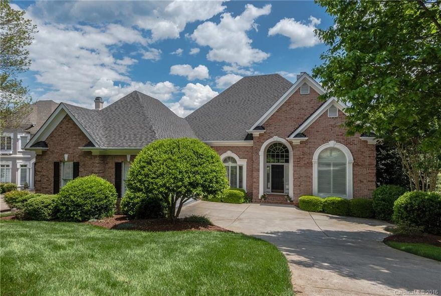 This distinctive custom floorplan takes advantage of stunning lake & golf course frontage. Perfect for entertaining; features ML master, 3 LL BRs, 12' ceilings in redesigned LL w/ 2nd kit, remodeled KT & master BT, lovely trimwork, open plan, abundance of windows & numerous upgrades. Recently added outdoor living, new landscaping, new conditioned wine room & 270 SF custom MBR closet make this a most unique home. Short walking distance to outstanding BCC Activity Center, pool, tennis, fitness!