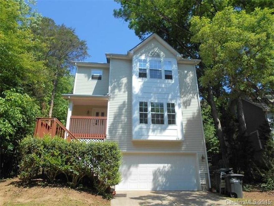 Rare Tega Cay home w/4 beds and 2.5 baths + 2 car gar w fenced yard across from the golf course under $260,000! Hardwoods on Main, Great Rm w fireplace, Living Room, Formal Dining Room. Open Kitchen, lots of cabinets and extra counter space. Custom decking at front and back. Spacious Master Suite w/walk in closet, double vanities. Large secondary bedrooms. Basement Den, Office or Mom Cave. TOP schools. Low Taxes. Close to highways, shopping and dining. Coming: New APPLS, Cabinets + Kit Granite!