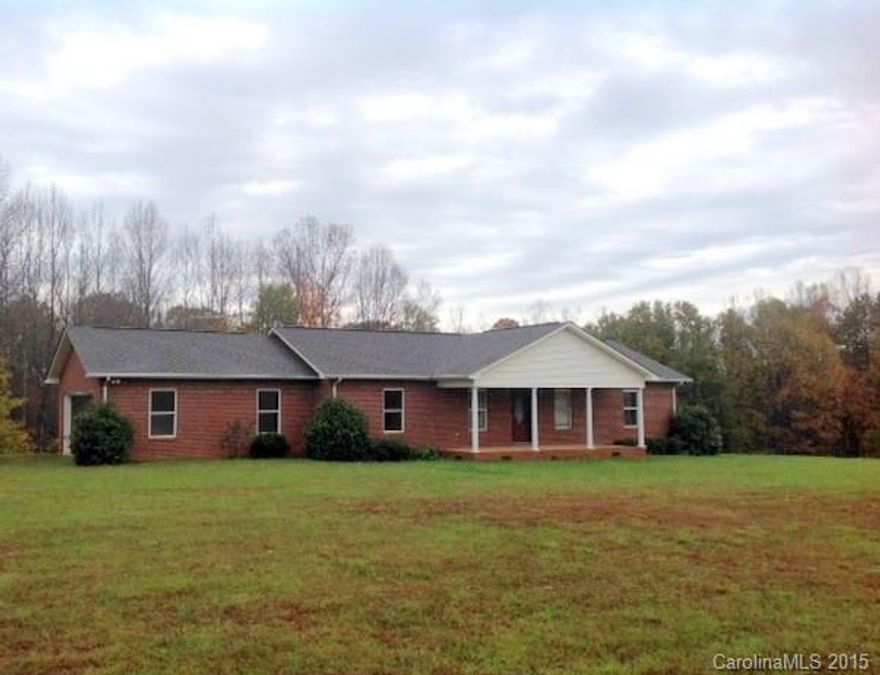 Visit this completely updated brick ranch home with 4.76 acres of land.  The home boasts new carpet, new paint , new well, HVAC system installed in 2014 and has a fenced pasture. The land is a mix of pasture and hardwoods that includes a creek and barn. Schedule your showing today!