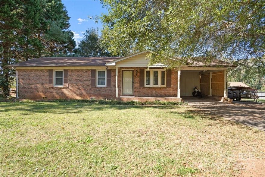 Welcome to this beautifully maintained 3-bedroom, 1-bathroom all-brick home located close to shopping and restaurants. With a spacious layout, this residence offers a warm and inviting atmosphere perfect for families or anyone seeking comfort. Step inside to find a nice open floor plan with a bright and airy living room, ideal for gatherings or quiet evenings at home. Large backyard perfect for entertaining.