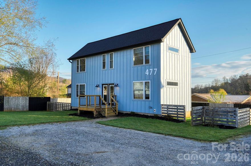 Modern 2-story home built in 2022 with a sleek, contemporary feel just minutes from downtown Waynesville. Bright and open with large windows, abundant natural light, and a fresh, modern palette throughout. Features include light flooring, granite countertops, tiled showers, and quality finishes. Flexible floor plan with a primary suite on the main level and a second primary upstairs, plus a bonus room ideal for an office or additional bedroom. Perfect for a variety of lifestyles, including multi-generational living. A fenced yard offers space to relax or entertain. Energy-efficient heat pump and low-maintenance newer construction. Public water and sewer. Also, see agent remarks.