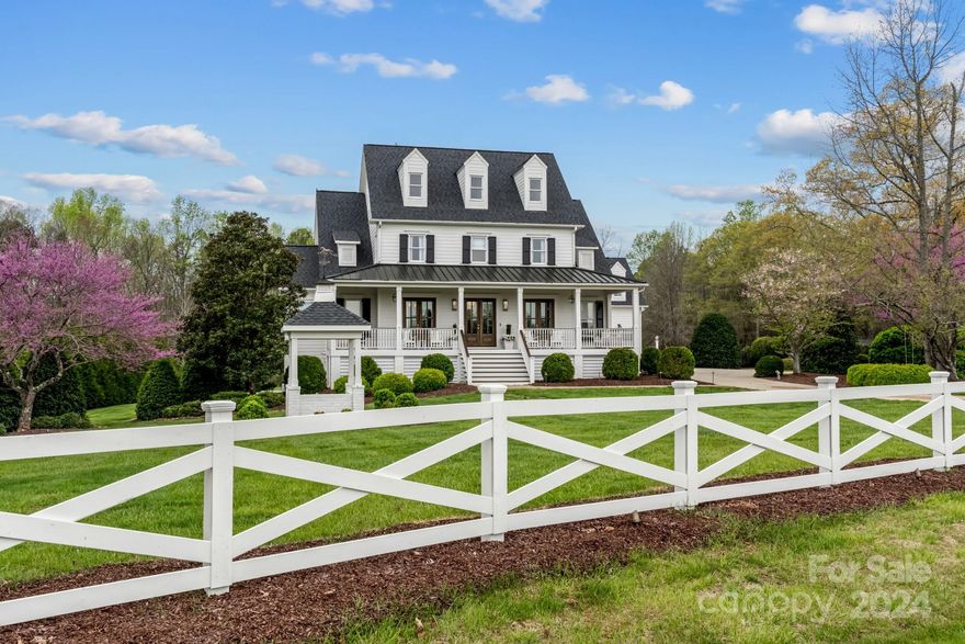 Situated in the Davidson Farms Equestrian community, this
stunning home in Davidson, NC was fully renovated in 2023 and boasts a spacious 5,947
square feet of finished living space spread across 3 stories. This sprawling home includes
a finished basement, bunk room, 5 bedrooms, 4 full bathrooms and 2 half bathrooms.
Situated on a generous 2.09 acre lot, enjoy the views of rolling horse pastures while rocking
on your wrap-around front porch. No detail was overlooked in this custom home
renovation! Every room was completely renovated/updated, new roof, new fire places, new
flooring throughout, all new light fixtures, new door handles and hinges, all new bathroom
fixtures, new custom cabinetry, new appliances and much more!
