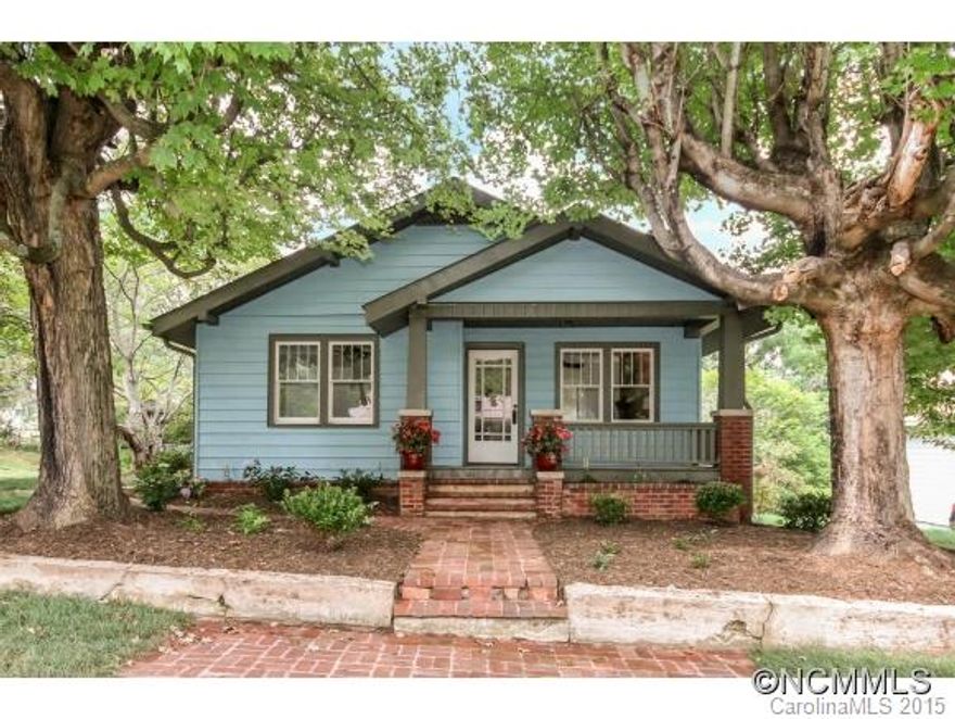 Gorgeous Craftsman style bungalow in West Asheville, just one block from Haywood Rd. Completely renovated in 2015, this spacious home features a brand new kitchen, plumbing, electrical and HVAC, finished walk-out daylight basement with multiple bonus rooms. Relax on the covered front porch and entertain on the large brick patio. Classic character with all the conveniences and comfort of a modern home and an easy walk to west side or River Arts!