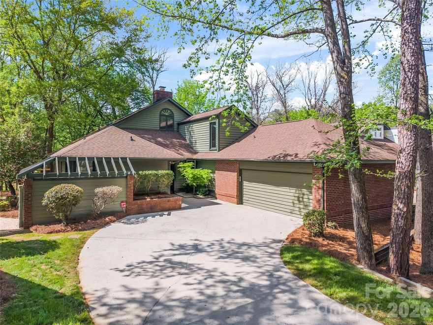 Multiple offers received.  Highest and best by Saturday @ 12.  Nestled in the intimate Providence Landing community in south Charlotte, this contemporary residence offers 2,554 square feet of thoughtfully designed living space. With three bedrooms and two baths, the home features a unique layout centered around a split bedroom plan with all bedrooms on the first floor, enhancing privacy and quick access. A soaring ceiling and expansive windows fill the interiors with natural light, highlighting beautiful hardwood floors and airy lines throughout. The private, natural setting is framed by mature trees, creating a serene backdrop for daily living and entertaining. The property opens to a huge new deck, perfect for outdoor gatherings, lounging, or al fresco dining. Residents benefit from front-yard maintenance by the HOA, easing upkeep in this small, intimate community. Located in a sought-after school district, this home combines location, style, and practicality in one compelling package.