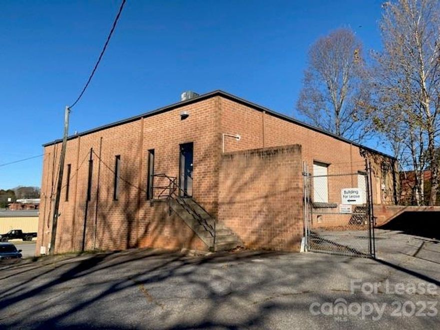 Available May 1, this spacious upper-level brick warehouse in Hickory, offering 4,800 square feet of warehouse space with 12 ft ceilings and office space. This facility features central heating, two dock doors for efficient logistics, and parking in the paved area shared among tenants on the lower level. Seize the prime opportunity to establish or expand your business in this strategically located, well-maintained facility. Addl $50 water/sewer fee.