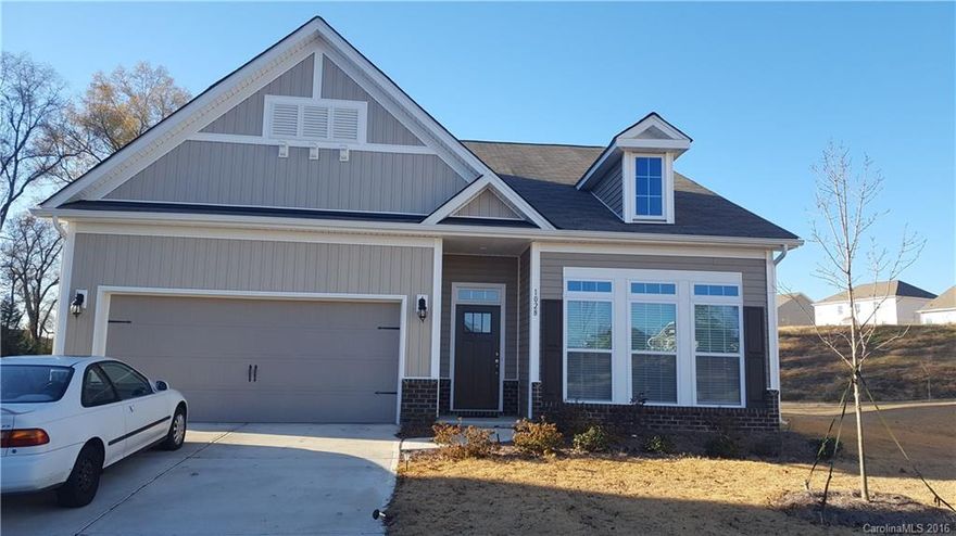 Timberlake S/D.. The Azalea plan features 10 ft ceilings, open floor plan, stainless appliances, granite, wood floors, spacious kitchen Island, sitting on a larger cul de sac lot. Neighborhood features pool and play area.