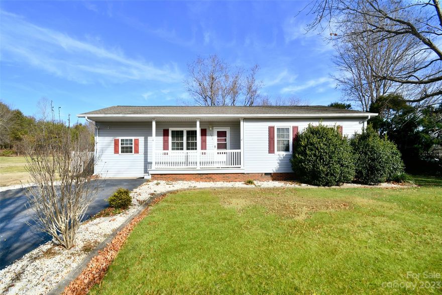 Ranch home with open floor plan. 3 beds/2 baths and a flex room that is being used as a 4th bedroom. 3rd bedroom has an ensuite. Laundry room is located off of the kitchen. Sunroom located in back of the home overlooks large fenced back yard. The outbuilding and small barn in the back are wired with electricity and are great to use for a workshop, housing animals, outdoor bar or storage.