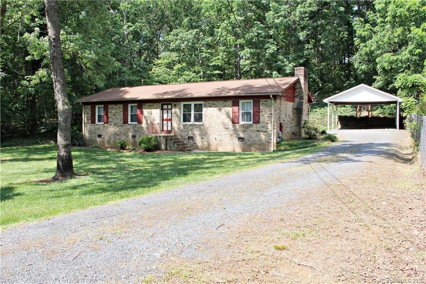 Roomy 2 bed/2bath ranch conveniently located in South Stanly. Open floor plan has newly carpeted living room and spacious eat-in kitchen. A den just off the kitchen provides extra living space, complete w/ fireplace. Bedrooms have hardwood floors. Insulated windows allow for nautral light. A deck off the back, and large yard with plenty of shade make outdoors enjoyable. Bonus: Storage building and two car carport. Great location convenient to shopping and restaurants in Norwood! Call today!