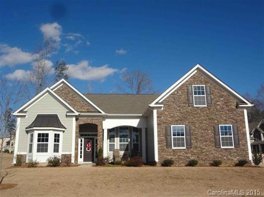 Dramatic Split Bedroom Ranch Cynthia Plan by DR Horton. w/bonus & half bath above garage. Large open Great room w/gas fireplace. built-in book case, Kitchen has upgraded cabinets, stainless appliances, granite counter tops & tile back splash. Hardwoods in foyer, kitchen/breakfast. Master bath has garden tub & separate walk in shower. Covered porch at rear of home. Beautiful stone front w/side entry over sized two car garage, fenced rear yard, corner lot, impressive gated entrance to subdivision.