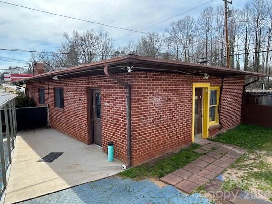 Prime commercial opportunity located in the heart of Rutherfordton! This versatile property offers multiple possibilities; Hair Salon, Office space, or even Retail. The property is fenced and has multiple entrances into the building, and offers plenty of formal parking. Located on the busy S. Main Street (221) of Rutherfordton. The high visibility and a strategic location make this a rare find for entrepreneurs and developers alike! Please note - the adjacent commercial property is available for purchase as well, see MLS #4353181.