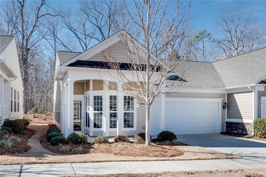 Cozy Kenwood Model with Sunroom. Crown Molding & Hardwood Floors Throughout the Main Living Space. Foyer Leads to Spacious Great Room & Dining Area. Kitchen with Granite Countertops, Maple Flat Panel Cabinetry, Stainless Steel Appliances, & Breakfast Nook. Bright & Airy Sunroom Leads to Rear Yard with Wooded View & Privacy Partition. Entire Home Freshly Painted with Sherwin Williams Premium Paint. Enjoy Easy Living & Amenities Galore in this 55+ Active Adult Community!