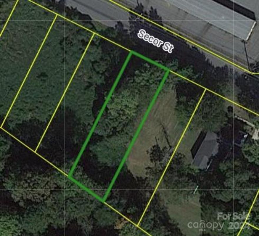 Great building lot in Statesville.  Relatively flat with water and sewer available at the curb (tap fee required).  Bring your own builder and enjoy this fantastic location in the heart of Statesville. Zoned R-5 and R-5 M, which allows stick built or manufactured homes on this lot, per Statesville Zoning, with 5' side yard and 25' front and rear yard setbacks.