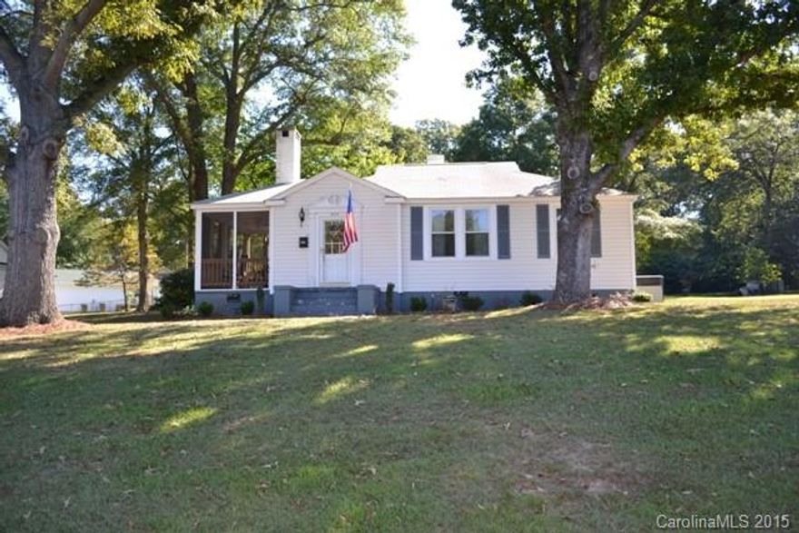What a dollhouse!  Very unique home with tons of character! Great room w/ gorgeous hardwoods and wood burning fireplace! Cozy dining and kitchen combo features beautiful cabinets, electric cooktop range,  stainless appliances fit any gourmet chef! Spacious three bedrooms w/ beauitiful hardwoods! Huge rocking chair screened porch to sip on hot cocoa!  Detached carport and storage shed! Minutes from downtown and Historic Fort Mill!