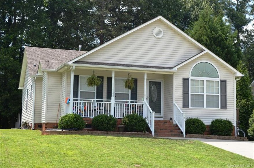 Easy stroll to Lake Wylie and Ebenezer Park in this quaint lakeside community. Great Ranch with open floor plan.  Enjoy the vaulted ceiling, ceiling fan and fireplace in Great Room. Tray ceiling and ceiling fan in Master bedroom.  Spacious eat-in- kitchen. Covered front porch, 12 x 10 wood deck & 12 x 10 storage building. Convenient to everything and County Taxes!