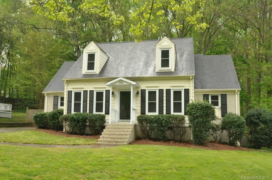 Dreamy Cape Cod on cute winding lane. Great living space with a formal living room and dining room plus a cozy family room with brick fireplace.  Kitchen has been updated with new cabinets, granite countertops and tile backsplash .  Sliding door to a great deck for BBQ's overlooking a beautiful "woodland" back yard filled with azaleas. Plus a crafters workshop.  Master on the main has remodeled bath. Two spacious upstairs bedroom and lots of storage in the walk in attic! Excellent Location!!