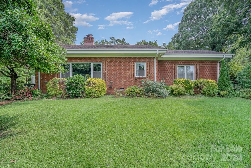 Nestled on nearly an acre (.99 acres) of prime real estate, this exceptional property offers a serene rural ambiance right in the heart of Charlotte. Imagine the perfect blend of country living and city convenience, providing a unique opportunity for those seeking a spacious retreat without sacrificing accessibility. Surrounded by nature yet moments away from the vibrant amenities and attractions of Charlotte, this rare find is a hidden gem waiting for your vision. Don’t miss the chance to own a slice of rural paradise within the city limits!