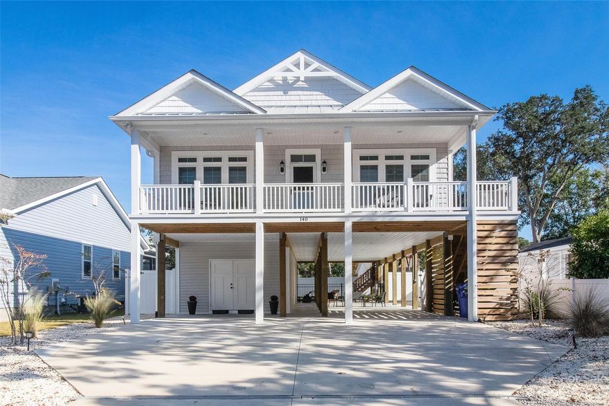 STUNNING WEST END BEACH HOUSE! Bright and sunny open living in this 3 bedroom, 2.5 bath custom home just a 5 minute bike ride to warm sand and sparkling Atlantic Ocean vistas. All relaxation and no work! Gorgeous kitchen features upscale cabinetry, beautiful granite countertops, and stainless steel appliances. Luxury vinyl plank leads to a spacious master en-suite, 2 guest rooms, and a wonderfully welcome screened porch. Transoms over the doorways and abundant windows enhance a comfortable coastal floor plan including an extra special laundry room! Enjoy the outdoors on a covered front porch, grilling deck, lower patio decking, and a completely fenced backyard. An outdoor shower and half bath downstairs plus storage is super convenient after a day at the surf and for storing beach gear. More to see in a great location close to Middleton Avenue and the Intracoastal Waterway!