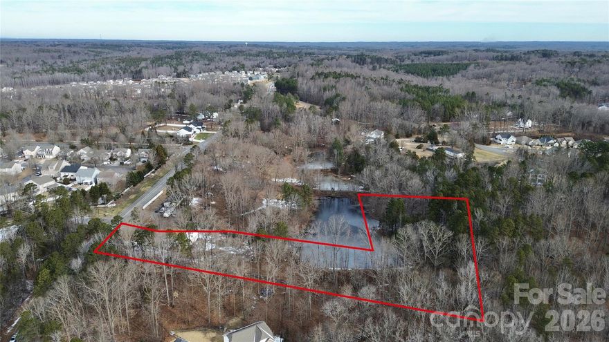 Take advantage of a unique opportunity to own level land in one of the Davidson area’s most desirable settings. Whether you are an individual looking to create a custom home or exploring future possibilities, this property offers a flexible and appealing option. With convenient access to Hwy 73, I-77, and I-485, you are minutes from popular destinations such as Concord Mills and the North Creek Shopping Center. Located on a peaceful road lined with mature trees, the property provides an ideal balance of accessibility and a quiet, established atmosphere. Opportunities to purchase land in this area are limited, don’t miss the chance to secure a well-located parcel in a highly sought-after location.