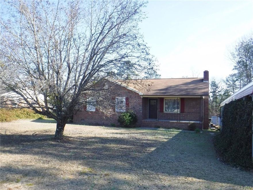 Neat as a pin! 3BR2BA brick ranch on almost 1 acre. Great sunroom, fireplace with wood stove insert. Fenced back yard, huge 20 x 50 +/- carport, 2 detached storage buildings that are wired. Just 8+/- minutes from I-77