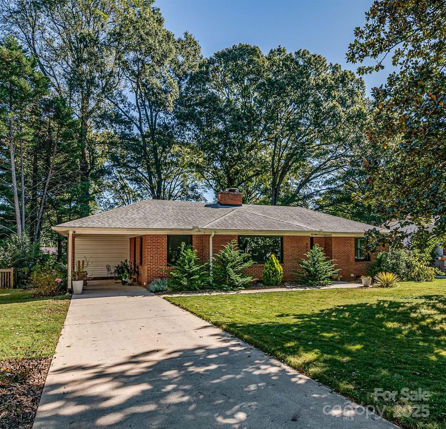 Don't miss this GORGEOUS full brick home in the heart of Madison Park! Fantastic location on a private .3 acre fenced lot with storage or workshop space. Cozy, light filled living room with picture window overlooking landscaped yard. Home features large primary bedroom with sitting area. There are two additional bedrooms and newly remodeled bathrooms. Pristine refinished hardwood floors throughout. Majority of the windows have been replaced along with new exterior doors, fresh interior paint, new tile in laundry, carpet in primary bedroom, insulation in attic, flooring and vapor barrier in crawl space. Unfiished basement with additional storage. Regrigerator, washer and dryer to remain. Within walking distance to Park Road with many shops & restaurants. WELCOME HOME!