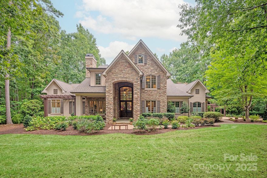 European style home on private 4 acre lot in popular Sanctuary community.Many great features including newer roof (2022) newer HVAC (2022), designer light fixtures & newer gas range (2023). Floor plan features a primary on main w/oversized walk in closet, additional guest suite w/full bath + a private office w/fireplace. Kitchen features a 6 burner gas range w/double ovens & commercial hood, built in fridge + large walk in pantry.Kitchen opens to a spacious Great Room featuring stacked stone fireplace w/custom built ins. Upstairs includes 3 spacious secondary rooms each w/a walk in closet + a large bonus room + 2 full baths. The 3rd floor provides a great flex space perfect for your home gym. The real gem of this property is the amazing outdoor features including an expansive covered screened porch w/vaulted ceiling & skylights, private sitting area w/wood burning fireplace, outdoor kitchen, greenhouse + extensive professionally designed landscaping.Don't miss the community amenities!