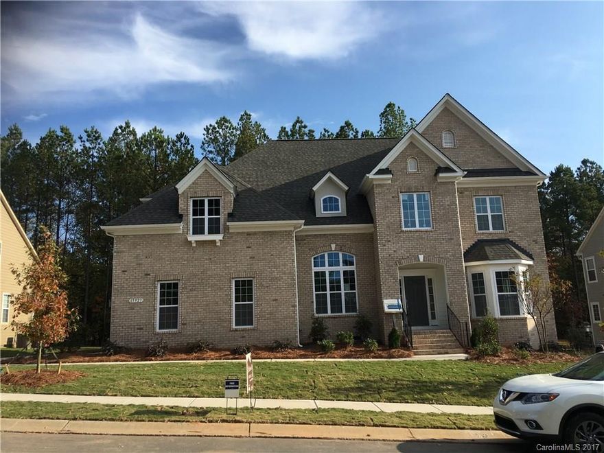 Soaring 2 story formal area, open floor plan, family room with gas fireplace. Kitchen has large island, Stainless appliances, 36" gas cooktop, built in wall oven, Painted cabs, quartz counters. Bay window in breakfast room. Great Master w/ huge WIC, luxury bath w/ 2 vanities, large tiled shower, soaking tub. Hardwood flooring mixed widths 3,5,7” throughout most of 1st floor, tile flooring in baths & laundry. Bonus room. Located in Palisades w/ great amenities, including pool, trails, fitness.