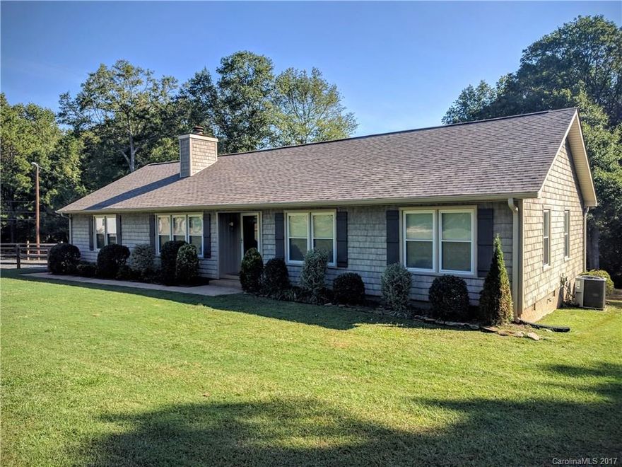 Lovely & well maintained 3BR/2BA home with updates, separate office, real fireplace, attached garage, screened porch & deck, newer outside vinyl siding, fenced-in yard with outbuildings on corner 1.7 +/- acre lot, Rock Hill schools located minutes from I-77 for commuters.
