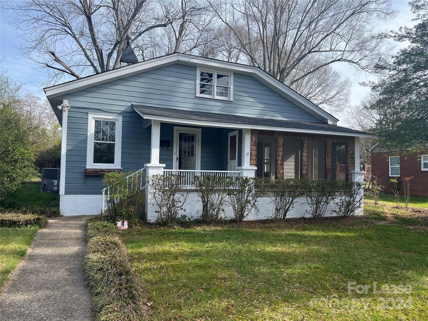 Adorable, spacious 3 bed, 1 bath, 1,429 sq. ft. ranch style home in Shelby, NC.  This charming one story house features a sunny living room and a cozy family room with a fireplace. At the heart of the home, the eat-in kitchen offers lots of cabinet space and a matching white refrigerator and electric range. Laundry appliances are also included for resident use. One bedroom has built in shelves and a desk, perfect for a home office or students! With a screened-in porch and a big back yard, you will have plenty of space to entertain or just relax and enjoy life. Located near I-85, Andrew Jackson Hwy., W Marion St., Shelby City Parks, and Restaurants.