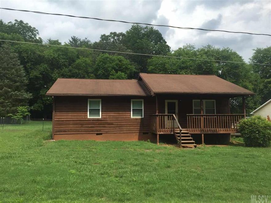 Ranch style home with lots of updates.  New flooring throughout, new kitchen cabinets, new deck on back, fenced in backyard. Ready to move in.  Eating area in kitchen. Located on quiet street.