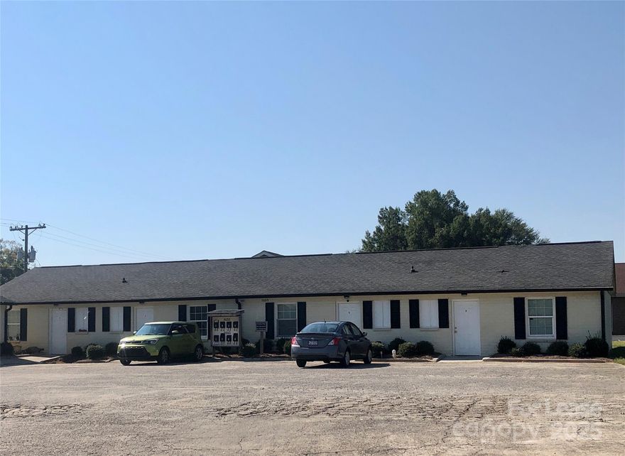 2 bed 1 bath apartment in Gastonia. Home is all electric with wall unit AC/heat. Neutral paint and flooring throughout. Home does come with Courtesy use only appliances (refrigerator, electric range/oven & washer-electric dryer hook-ups) Rent includes trash, lawncare & water.  *NO PETS