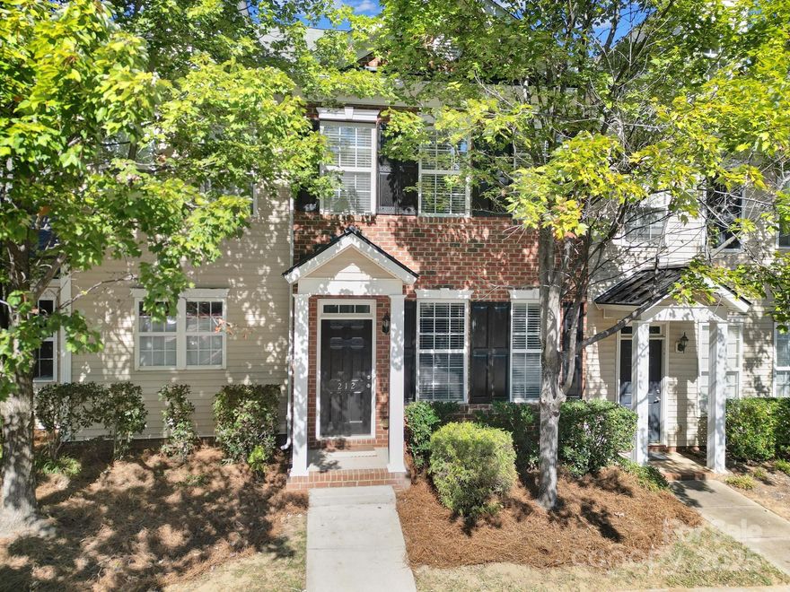 Welcome home to this beautifully renovated and move-in-ready townhome in desirable Regent Park, Fort Mill! This updated 2-bed, 2.5-bath residence perfectly blends modern finishes with low-maintenance living in one of the area’s most sought-after communities. Step inside to find fresh paint, new luxury vinyl plank flooring, new carpet, and updated lighting throughout. The bright, open-concept living area features a gas fireplace, elegant trim details, and effortless flow into the dining area and renovated kitchen with quartz countertops, stainless-steel appliances, and a charming arched pass-through. French doors lead to a private backyard with wooded views and no direct rear neighbors—perfect for relaxing or entertaining. Upstairs, both bedrooms offer en-suite baths and generous closets, including a walk-in in the primary suite. Additional updates include a brand-new HVAC system (Sept 2025). Conveniently located near top-rated Fort Mill schools, parks, shopping, dining, and I-77 for an easy Charlotte commute.