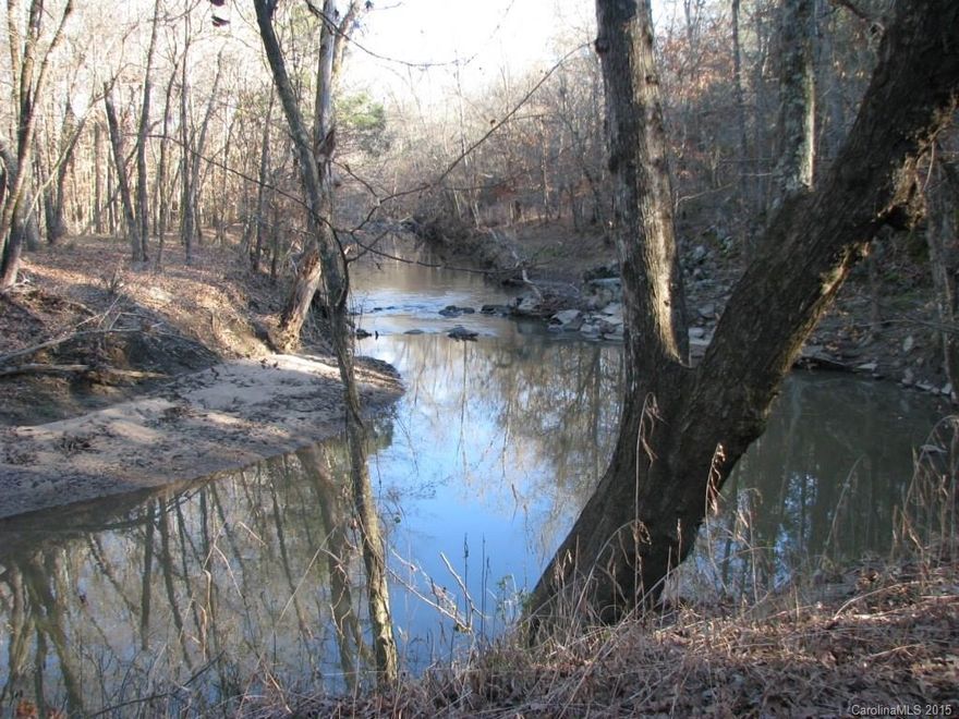 Rolling land from high ridges with cedars and pines to bottomland with nice hardwoods.  Nice walnut trees and other hardwoods growing on over half the land.  Almost 1/4 mile frontage on Sandy River which has nice deep banks and a wide flow with sections of nice rocks.  Good atv trail along the bottomland section.  Good wildlife signs on the land.  Sellers received a tax deed on March 14, 2014 from Chester County.