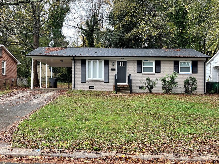 Newly renovated 3 bedroom home in the Smallwood neighborhood.  Kitchen completely remodeled with new cabinetry, large sink and sink lighting, garbage disposal, dishwasher, electric range, range hood and granite countertops.  Bathroom remodeled for more space with new bath/shower surround, large mirror,  wall to wall vanity with ample storage.  Spacious LR has bay window and ceiling fan with different light options. Separate Utility room with washer/dryer hook-ups and overhead cabinets.  Attached carport, fenced back yard, new roof and new HVAC system. Pets conditional with pet fee, no aggressive breeds.  All persons over the age of 18 must apply separately. Security Deposit to be determined based on outcome of tenant screening process (between one and two months rent).  Martin Luther King Park is at the end of street with a greenway that continues into Charlotte.  Approx 1.5 miles to access I-85, I-77, 1 mile to Johnson C Smith University, 2.5 miles to BOA Stadium and Charlotte Uptown