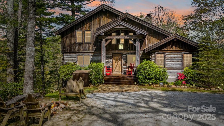 Tucked in the heart of Linville Falls, this fully furnished, hand-hewn log cabin is the kind of mountain escape that rarely comes to market. Crafted from antique logs and recently renovated, the home spans three levels and offers the perfect blend of rustic charm and modern ease. Every inch has been curated to feel like a retreat with brand new furnishings, two spacious living areas, and a bonus half-kitchen on the lower level ideal for multi-generational stays or hosting friends. Whether you're sipping wine after a hike or relaxing on the porch, this home offers comfort and space for everyone. Set on a private lot that includes the wooded parcels on either side, you’ll enjoy peace, privacy, and even the potential to expand or build additional homes. Just minutes to the Blue Ridge Parkway, Linville Falls Winery, top hiking trails, Grandfather Mountain, and only 25 minutes to Banner Elk and Spruce Pine. This turn-key property is ideal for high-end investment potential!