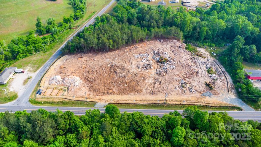 See map pin for exact lot location. CORNER Vacant lot perfect for creating your own business / retail store or for personal development. Property is 7.58 acres is in the middle of being cleared and graded by NCDOT. Process will take 8-12 months. Can be sold with 2 vacant lots across the street MLS#4255556 (0.86 acres) & MLS#4255761 (0.34 acres) for a total of 8.78 acres. Search MLS numbers for additional information.