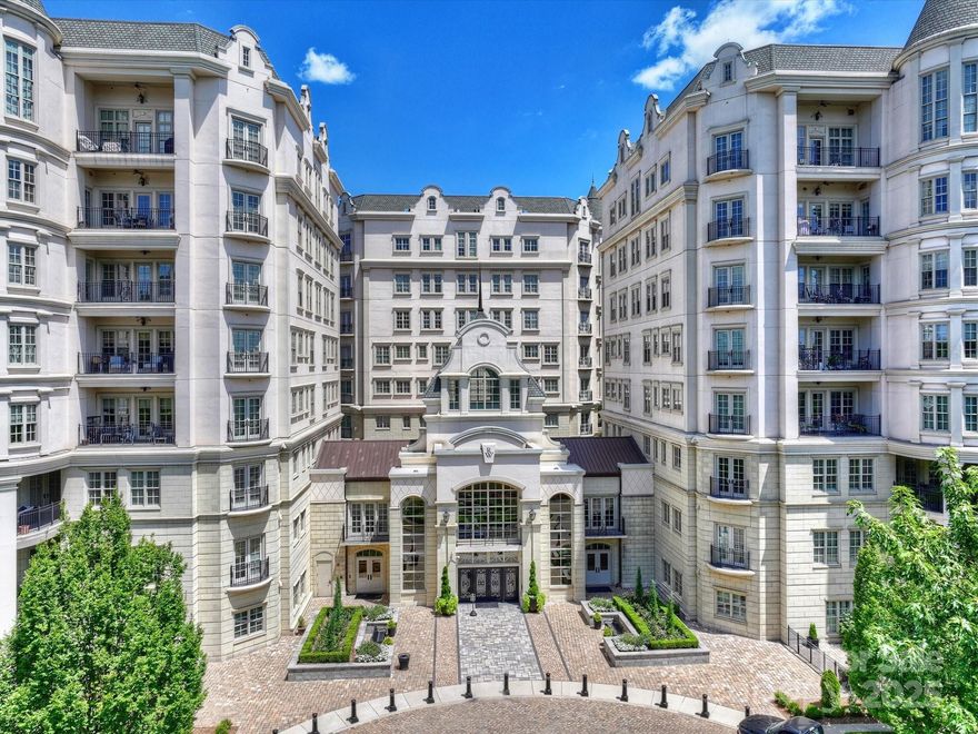 Experience refined living in this 3-bedroom, 3.5-bath condominium in the sought-after Rosewood at Providence. Located on the 7th floor, this light-filled home offers fresh paint, timeless design, and a layout that balances comfort and sophistication. A welcoming foyer and powder room lead into a spacious living area with a cozy fireplace, flowing seamlessly into the dining room and kitchen—ideal for everyday living or entertaining. Each bedroom features its own en-suite bath, and the generous primary suite includes two walk-in closets and a serene bath with dual vanities, a soaking tub, and a separate shower. Residents at The Rosewood enjoy an unmatched lifestyle with 24-hour security, concierge services, gated parking, a business center, fitness center, outdoor pool, and tennis and pickleball courts. The elegant gathering areas are complete with a gourmet coffee bar, fireplace, and card room.