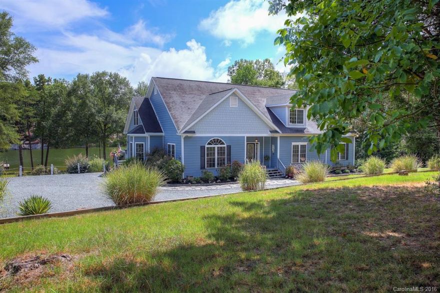 Magnificent waterfront home on an acre with 410 level ft. of lake frontage. Completely renovated, boasting 5 beds, 3 baths (4-bed septic rating). Plenty of space for the entire family to claim a place of their own, whether it be the open, gorgeous kitchen, the great room overlooking the lake, or the incredible bonus room with places for movie watching, billiards, exercising, computing and storage. Home has video surveillance, lake-side fire pit, dock, shed and boathouse. Awarded Clover schools.