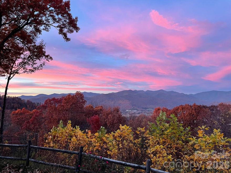 Breathtaking year-round long range mountain views! This brick two story traditional is upgraded with gorgeous cherry floors, a gourmet kitchen, Italian marble and so much more! Lots of living space inside with over 2,000 sq ft, a covered porch for quiet enjoyment. Outside is a flat yard for easy maintenance with sunny and shady garden areas. This quality home is in a gated community and features a private gated driveway. A very special place! 
A whole house generator w/500 gal propane tank for stove, fire logs and electrical outage backup; newly installed stainless steel pipes for a well, 861 feet deep and new 3hp well pump and control box.
Also on the property is a workshop/storage building with drill press, table saw and a variety of tools.
Newly paved road and larger culverts; Recently enlarged parking area for visitors and inclement weather .
Close to YMCA, large grocery store, restaurants and cute shops in charming downtown Black Mountain.