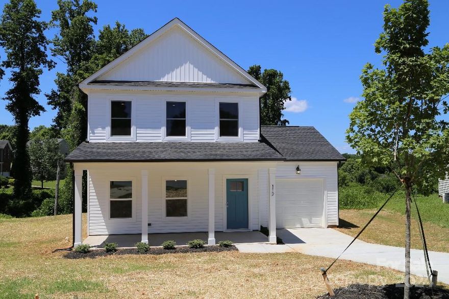 THIS CHARMING MODERN FARMHOUSE IS THE PERFECT PLACE TO CALL HOME!  With an open floorplan, plenty of natural light and tucked into a quiet cul d sac, you'll never want to leave!  Enjoy elevated green space views, privacy & sunsets!  Relax and refresh on the back deck or the rocking chair front porch!  This 3 bdrm 2.5 bath New Build on .27 acres, is minutes from downtown Mooresville shops, restaurants, & parks. All services and I 77 are close and convenient.  
Enjoy 9' ceilings, an eat-in island, a spacious laundry room, half bath and pantry downstairs  Large Pella windows fill the upstairs with an abundance of natural light!  The Spacious Primary boasts an en suite bath and a walk in closet with linen shelving. Ample storage in the full bath as well as finished storage under the stairs.  1 car attached garage with electric garage door opener and key pad.  LVP Flooring & carpet. Granite counter tops and soft close shaker cabinets throughout. A MUST SEE HOME !